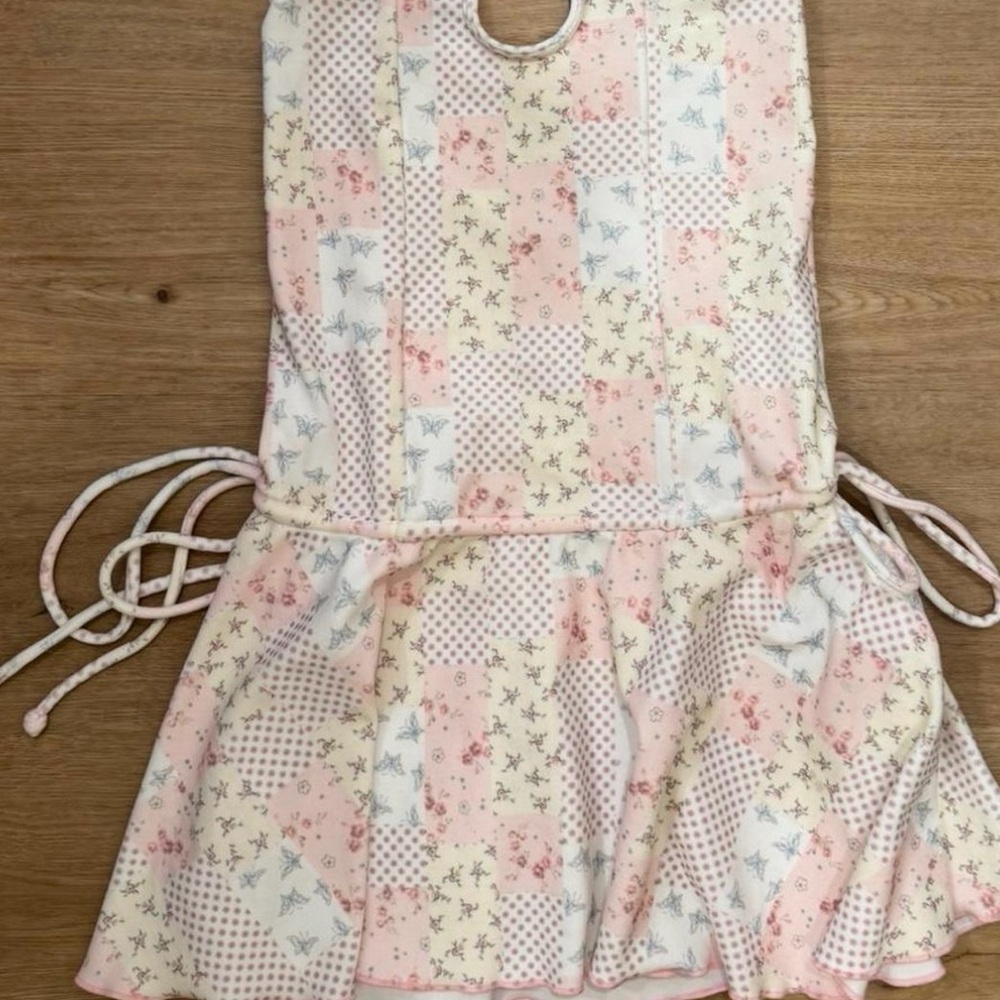 Frankie's Bikinis Kids Bib with Floral Patchwork